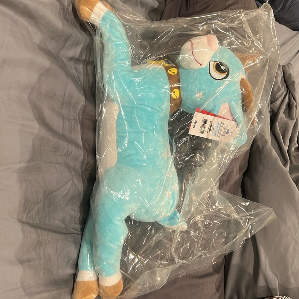 NWT “Tiptoe” Turquoise fleece top with matching stuffed animal.